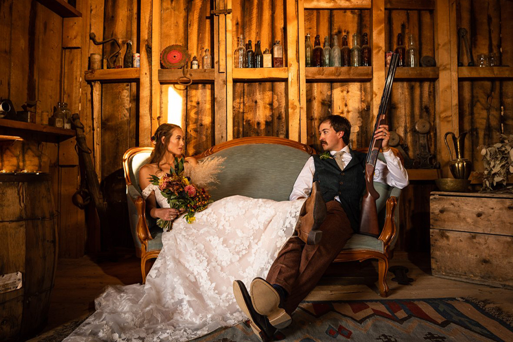 couple-in-whiskey-room-with-gun-2